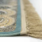 Carpets A close-up of a rug's edge, with a focus on the intricate patterns and the soft, fluffy texture of the rug's edge