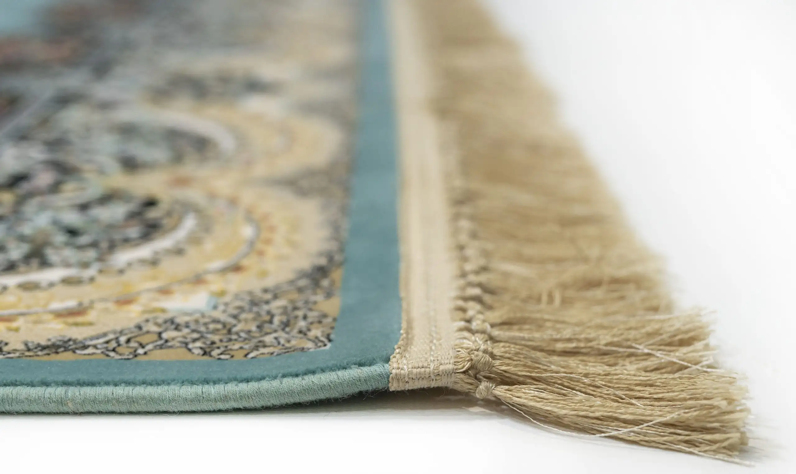 Carpets A close-up of a rug's edge, with a focus on the intricate patterns and the soft, fluffy texture of the rug's edge