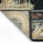 Carpets A close-up of a carpet's edge, showcasing its intricate design and texture, with a focus on the carpet's carpeting