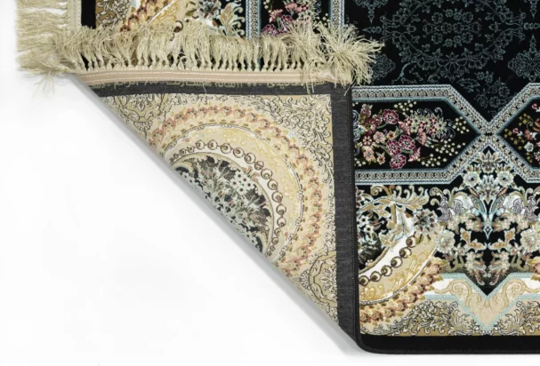 Carpets A close-up of a carpet's edge, showcasing its intricate design and texture, with a focus on the carpet's carpeting
