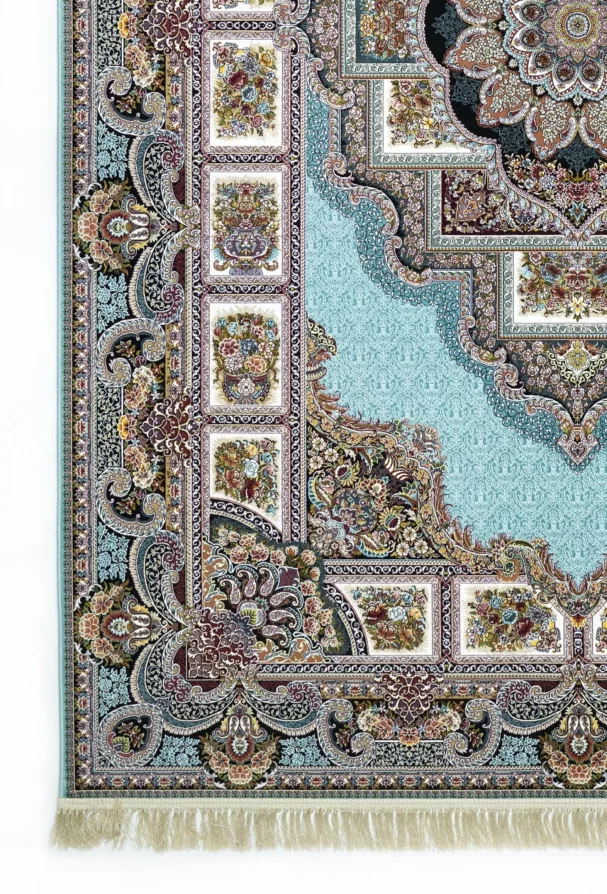 A close-up of a Qaleen Carpets rug with intricate patterns and a light blue background, featuring a mix of floral and