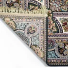 Carpets A beautifully crafted carpet with intricate patterns and a rich, vibrant color palette, perfect for adding a touch