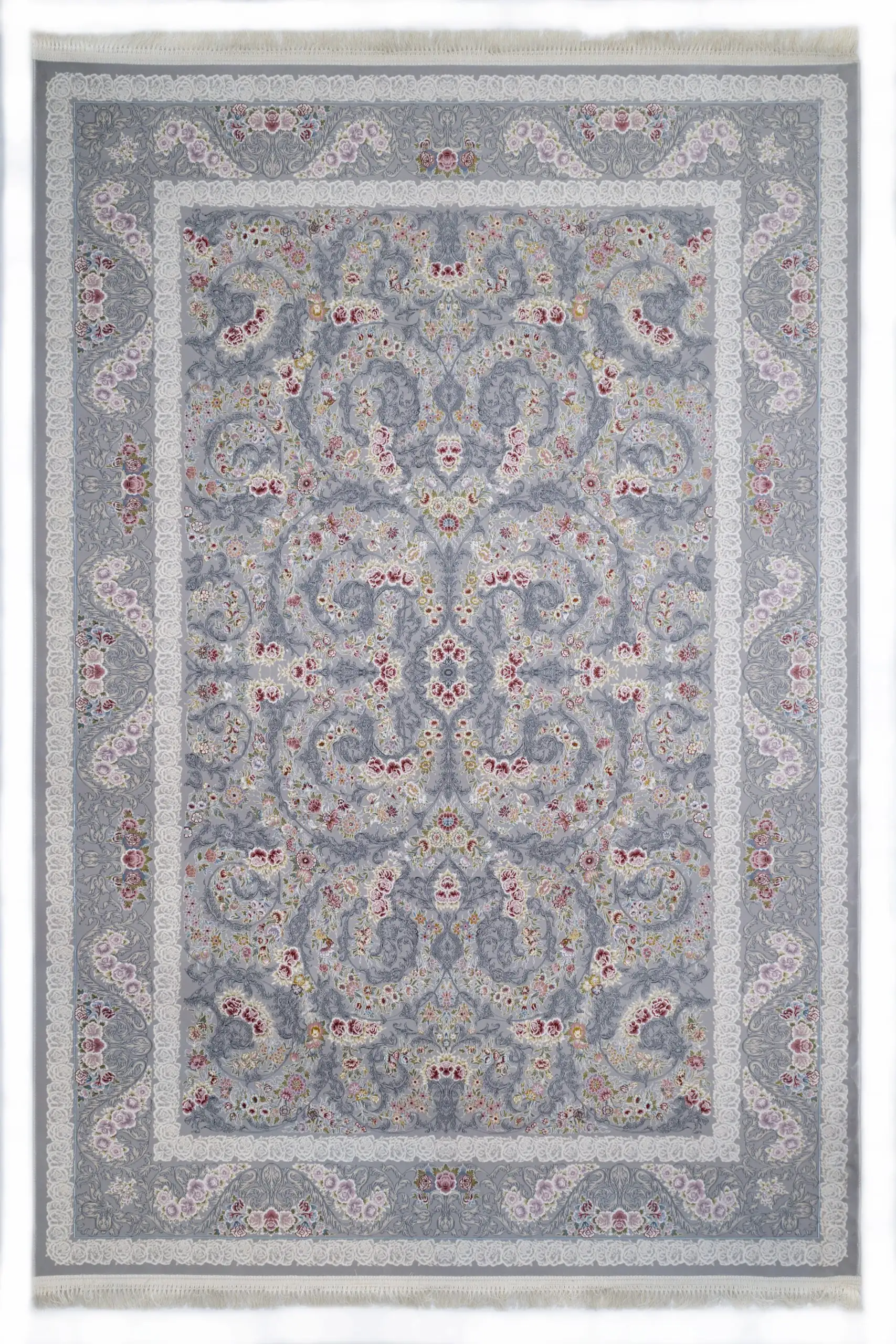 A Qaleen Carpets rug with a light grey and white patterned design, featuring a central floral pattern surrounded by a border