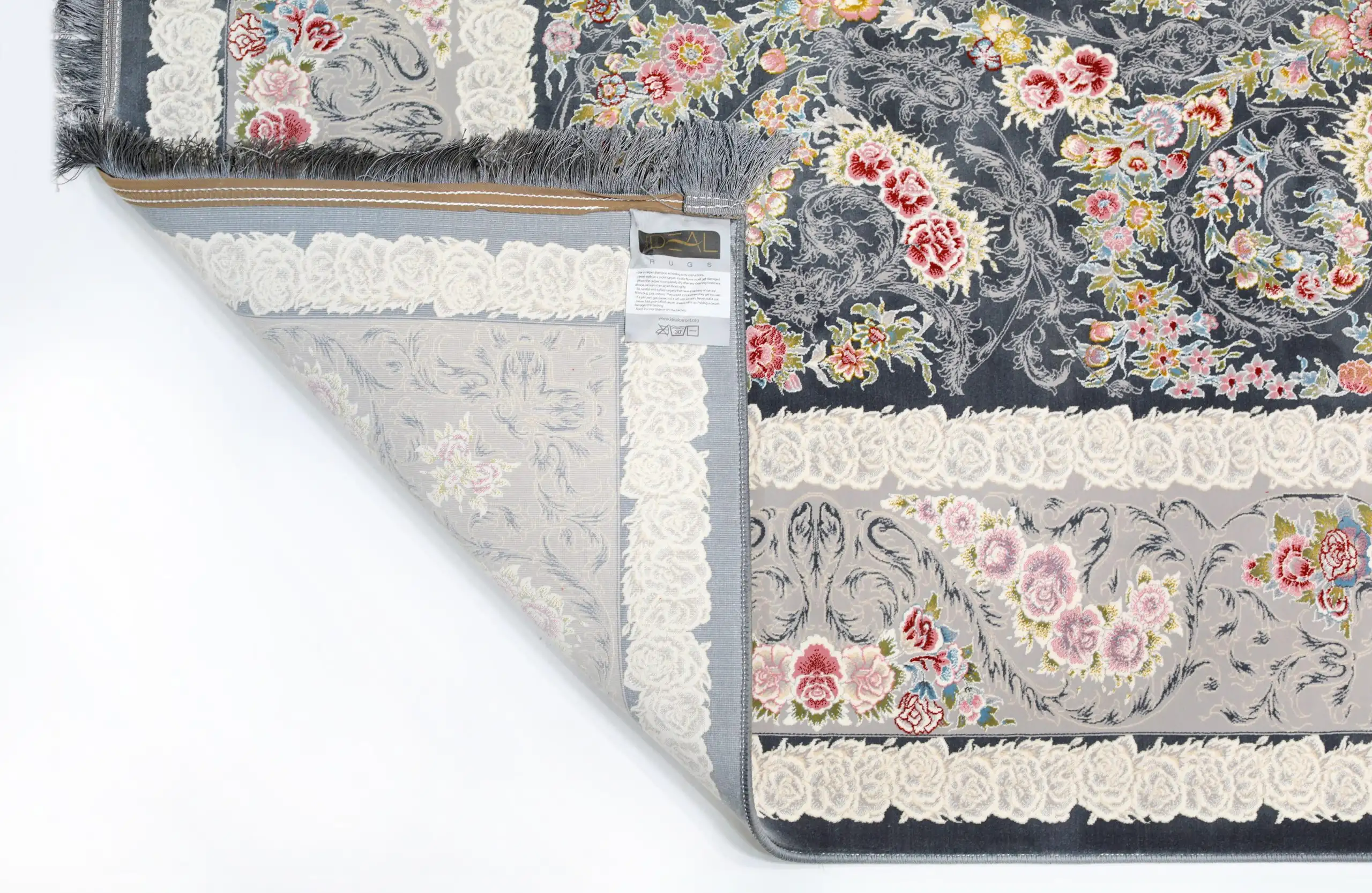 A beautiful, intricately designed carpet with a floral pattern, showcasing the art of carpets and rugs