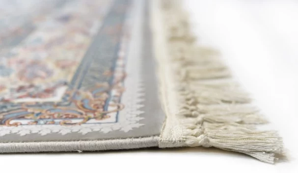 Carpets A close-up of a carpet's edge, with a focus on the intricate patterns and the soft, delicate texture of the carpet's