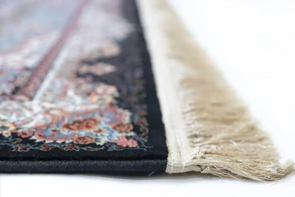 Carpets A close-up of a carpet's edge, with a focus on the intricate patterns and colors