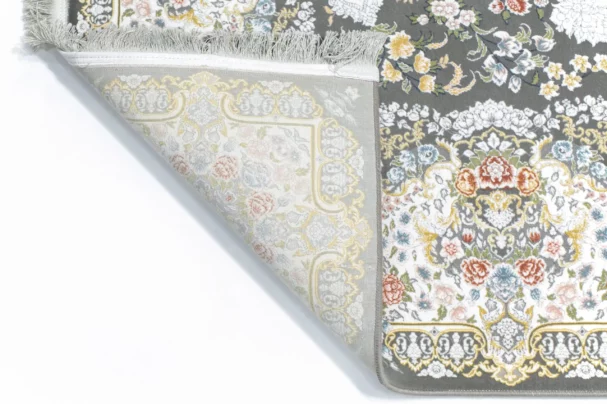 Carpets A beautiful, intricately designed carpet with a floral pattern, showcasing the art of carpeting