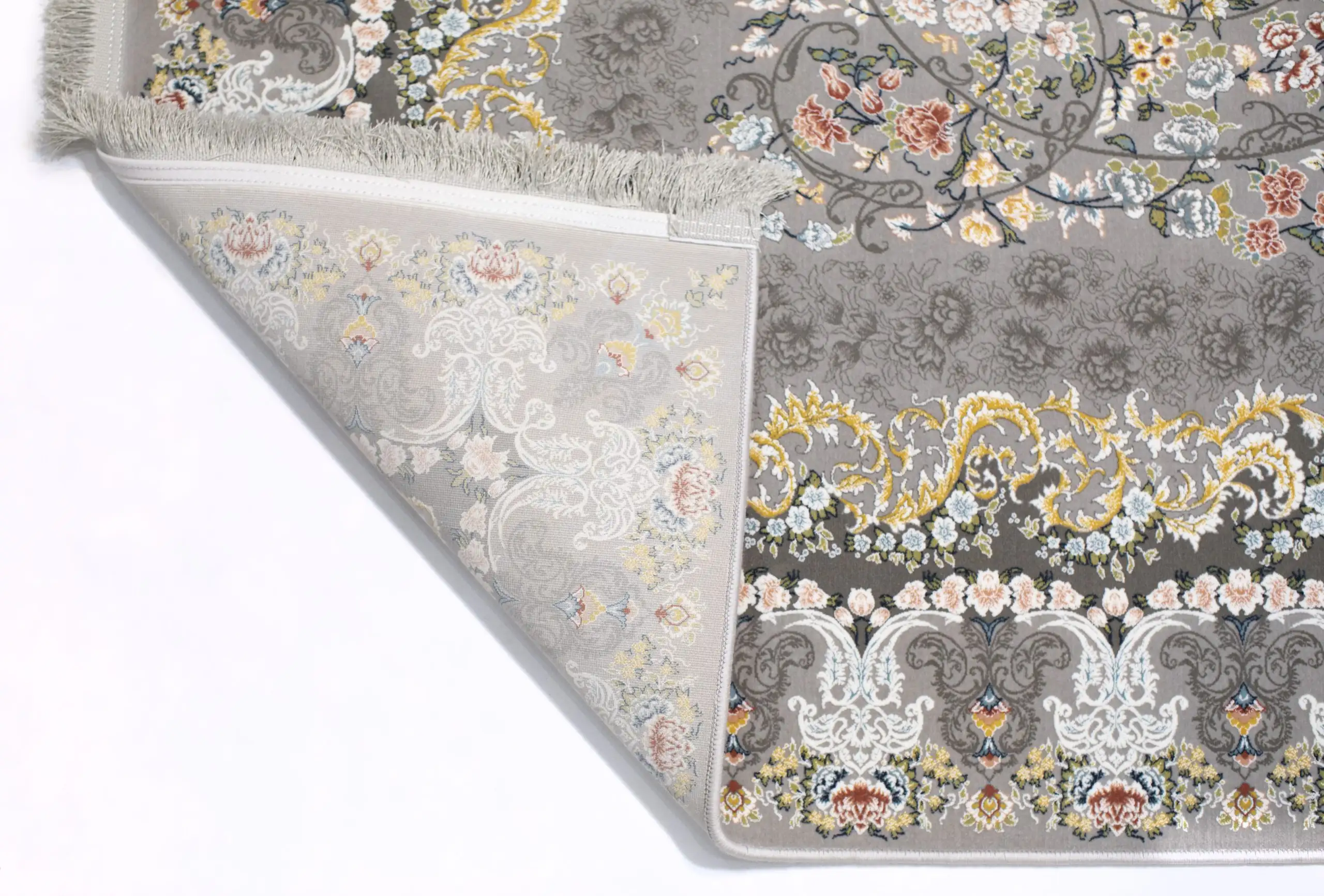 A beautifully designed carpet with a floral pattern, showcasing the art of carpets and rugs