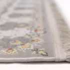 Carpets A close-up of a carpet's edge, with a focus on the intricate patterns and colors