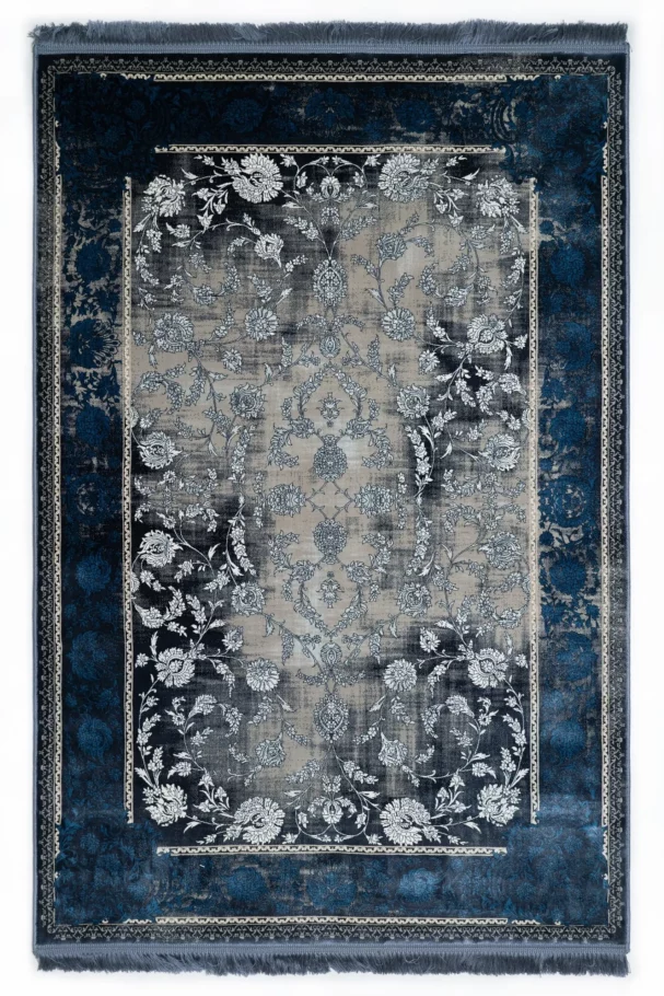 Carpets A beautiful, old, and worn-out carpet with a floral pattern