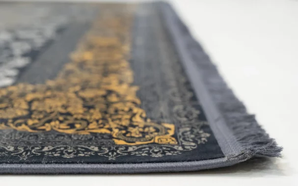 Carpets A close-up of a carpet's edge, with a focus on the intricate patterns and textures