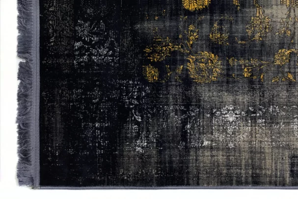 Carpets A dark, distressed carpet with a subtle gold pattern