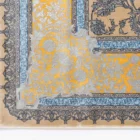 Carpets A beautiful, intricately designed carpet with a mix of yellow and blue hues, featuring a central pattern of flowers
