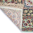 Carpets A beautiful, intricately designed carpet with a rich, vibrant pattern, showcasing the art of carpeting