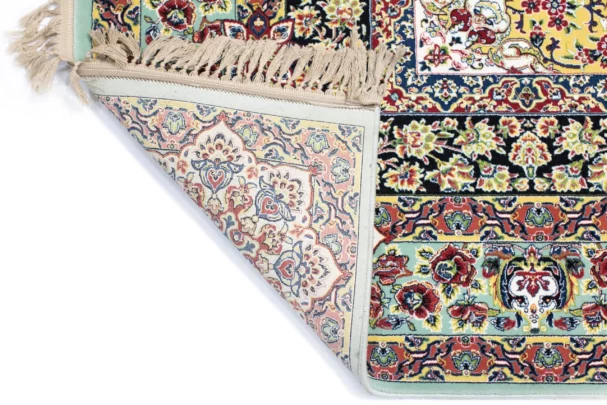 Carpets A beautiful, intricately designed carpet with a rich, vibrant pattern, showcasing the art of carpeting