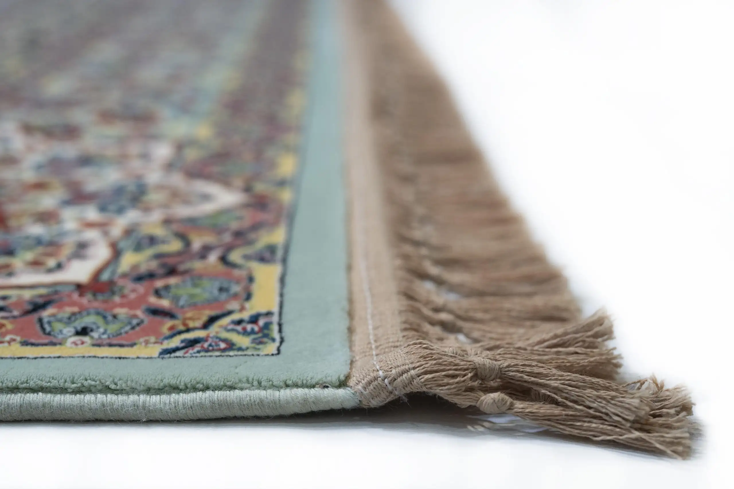 Carpets A close-up of a carpet's edge, with a focus on the intricate design and the soft, fluffy texture of the carpet's edge