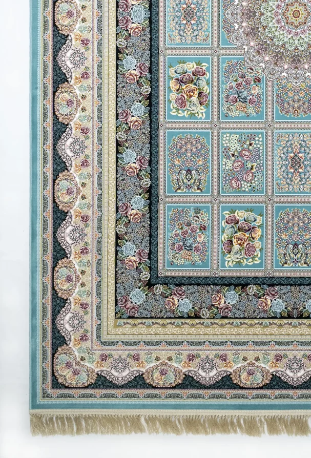 A Qaleen Carpets rug with a floral pattern and intricate design, featuring a mix of blue, green, and gold colors, with a