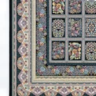 A beautiful, intricately designed carpet with a mix of flowers and patterns, showcasing the art of carpets and rugs