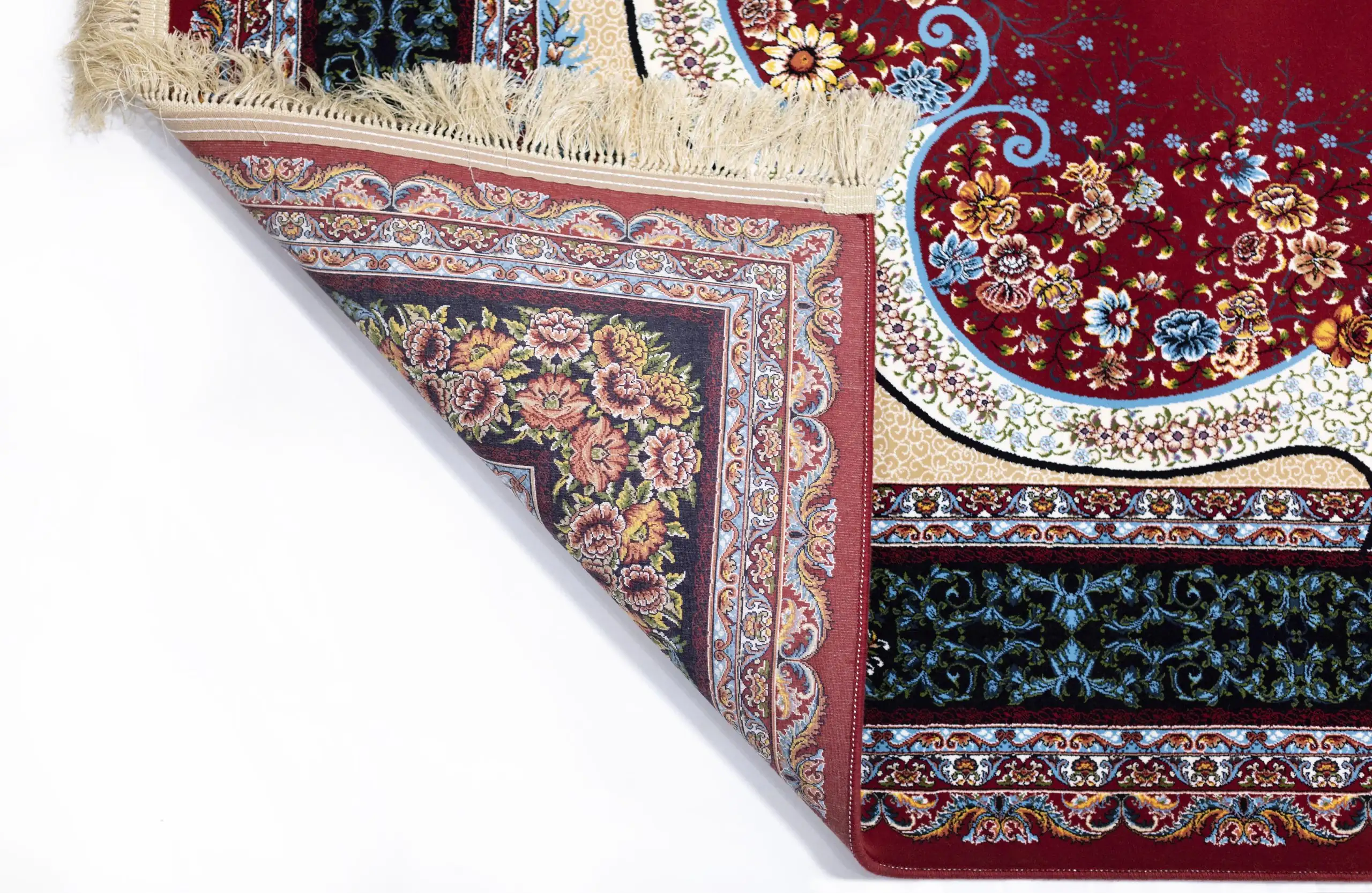 A Qaleen Carpets rug with a red, floral patterned design, partially unrolled to show its intricate details