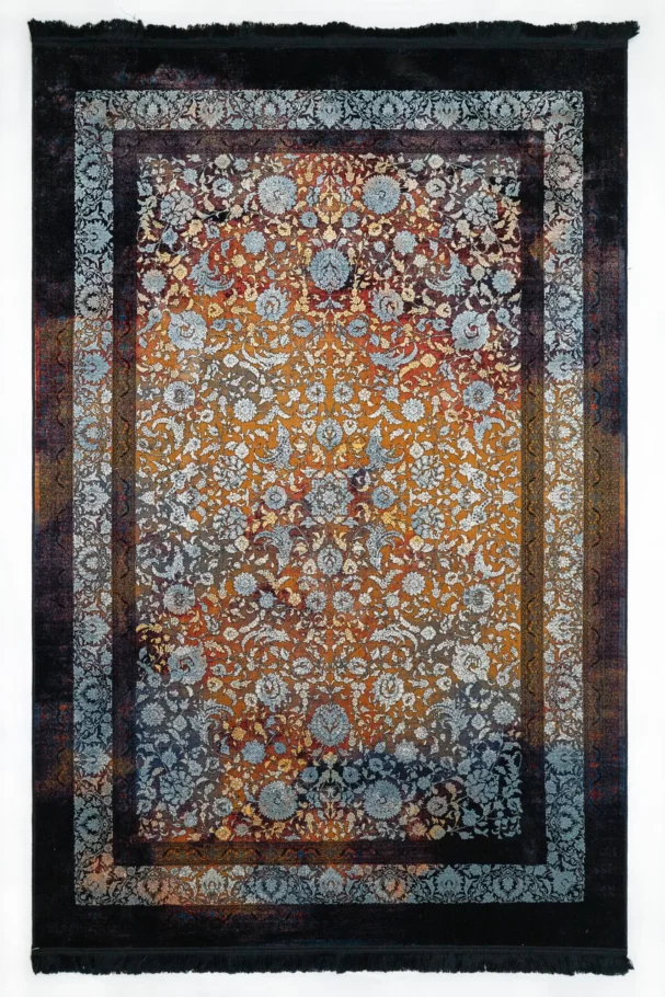A beautiful, intricately designed carpet with a rich, vibrant color palette and a unique, intricate pattern, perfect for