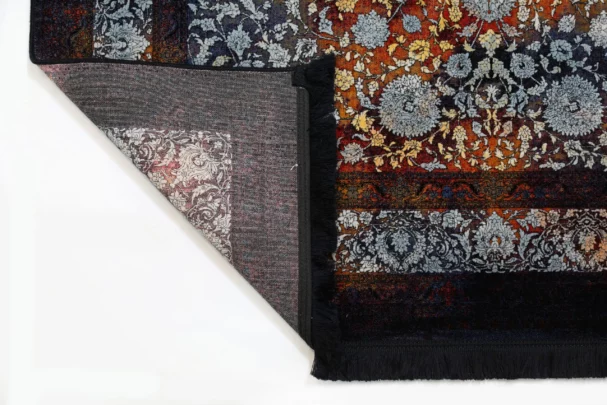 Carpets A beautifully crafted carpet with intricate patterns and a rich, vibrant color palette, showcasing the art of