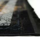 Qaleen Carpets' stunning black and gold area rug