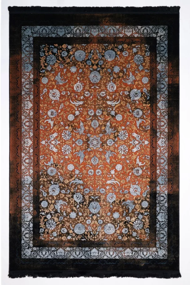 Carpets A vibrant, intricately patterned rug with a mix of red, gold, and blue hues, featuring a central design of flowers