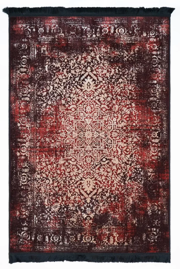 Carpets A rug with a red and white patterned design, with a black border and fringe at the top and bottom