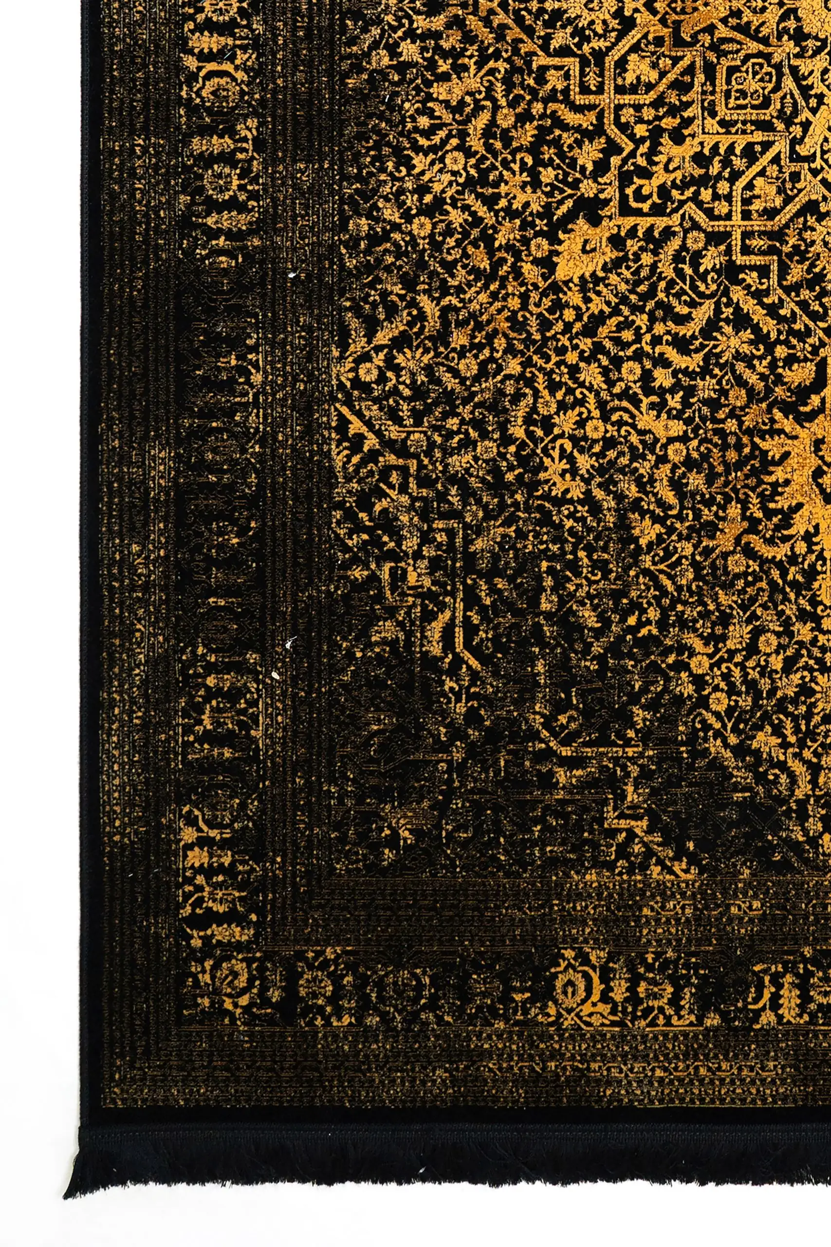 A beautiful, intricately designed carpet with a rich, dark background and a golden, intricate pattern, showcasing the art of