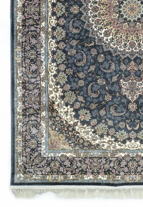 Carpets A beautiful, intricately designed carpet with a rich, dark blue background and intricate patterns of gold and white