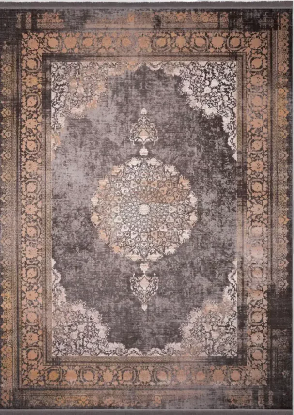 Carpets A large, dark grey carpet with a central, intricate pattern and a border of similar design, made of a material that