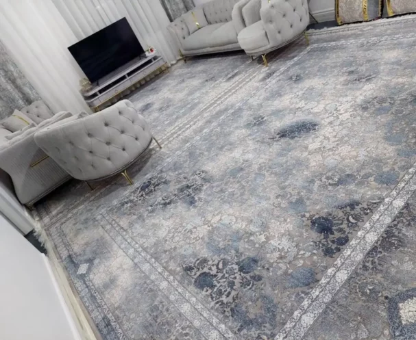 Carpets A living room with a large, intricately patterned carpet
