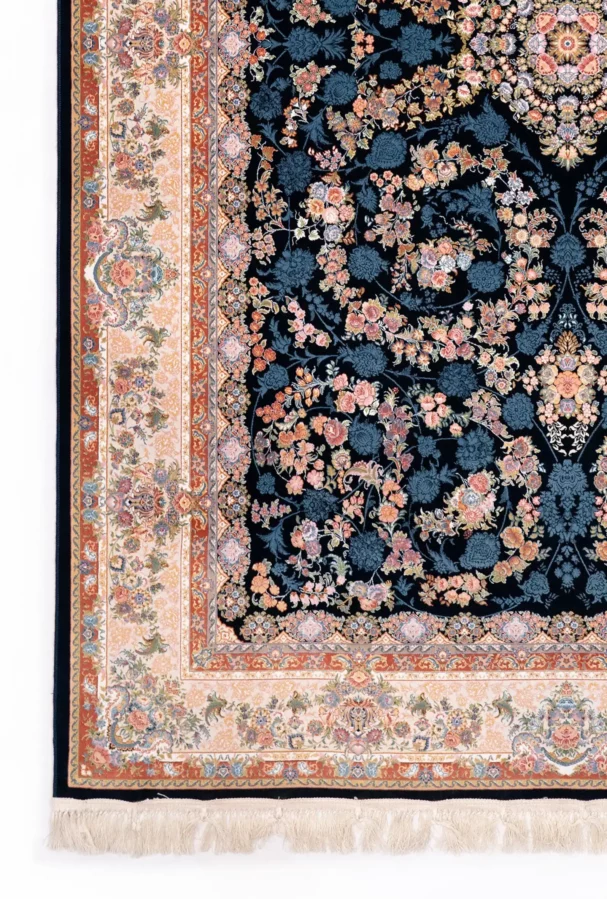 Carpets A beautiful, intricately designed carpet with a rich, dark blue background and a vibrant, floral pattern
