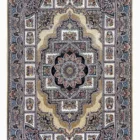 A Qaleen Carpets rug with a traditional Persian design, featuring intricate patterns and a rich, vibrant color palette