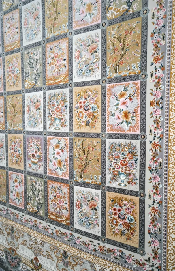 Carpets A beautiful, intricately designed carpet with a mix of flowers and trees