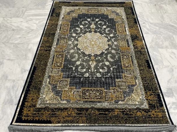 Carpets A rug with a dark grey and gold patterned design