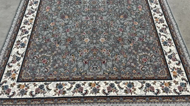 Carpets A beautiful, intricately designed carpet with a gray and white color scheme, featuring a floral pattern and a border