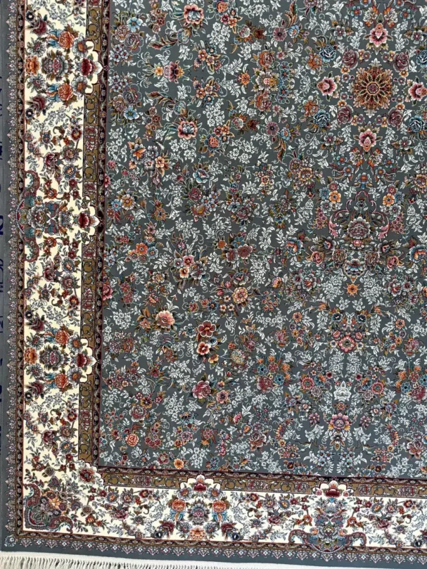 A beautiful, intricately designed carpet with a mix of flowers and leaves, made of high-quality materials, perfect for