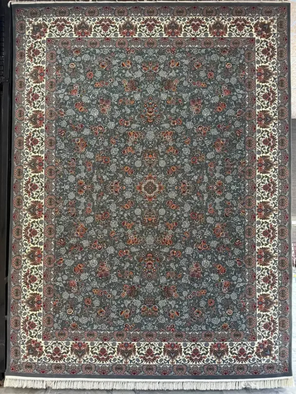 A Qaleen Carpets rug with a gray background, white border, and intricate red and white patterns
