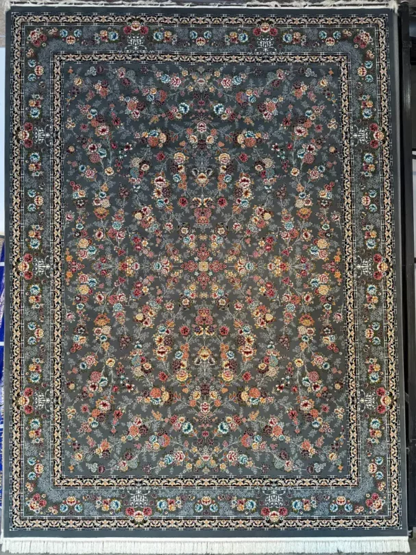 A beautiful, intricately designed carpet with a rich, vibrant pattern, perfect for adding a touch of elegance to any room,