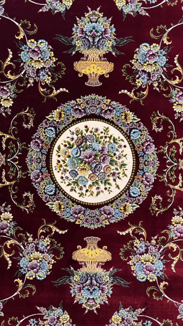 Carpets A beautiful, intricately designed carpet with a central floral pattern and surrounding flowers and leaves, set
