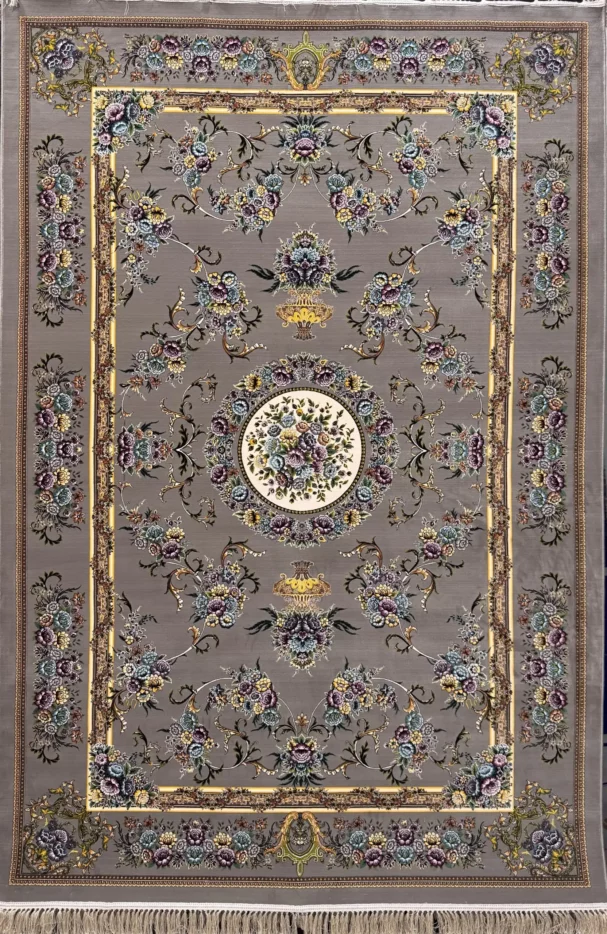 Carpets A beautiful, intricately designed carpet with a central floral pattern and a border of flowers and leaves, made of a