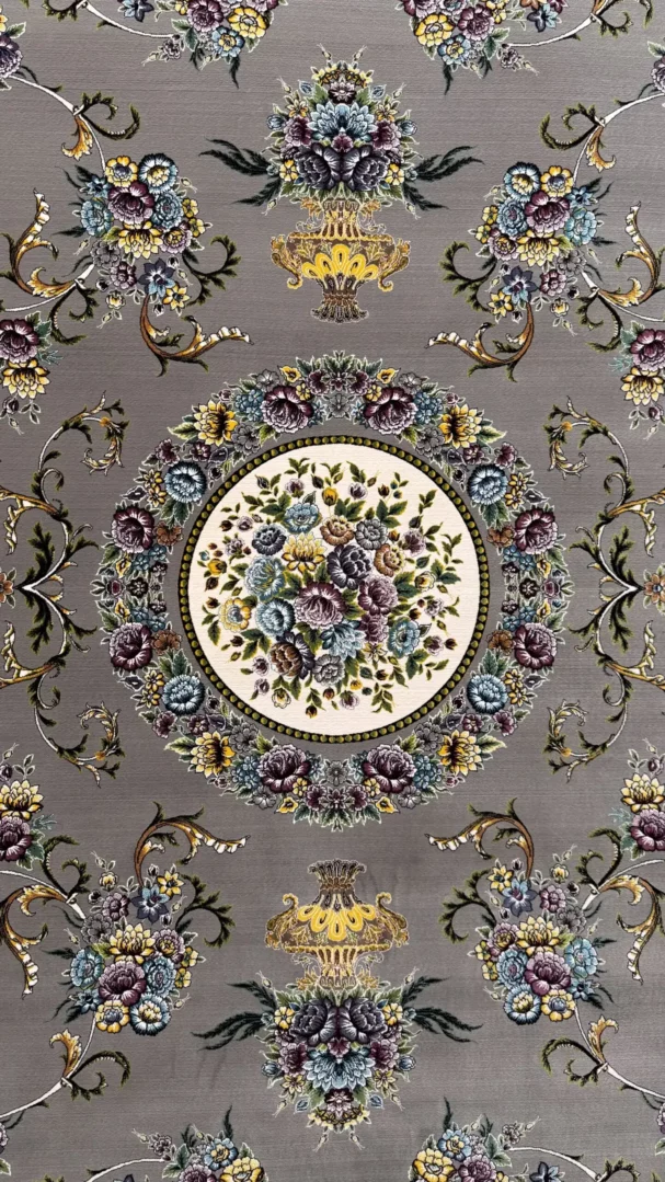 Carpets A beautiful, intricately designed carpet with a central floral pattern and surrounding patterns of flowers and