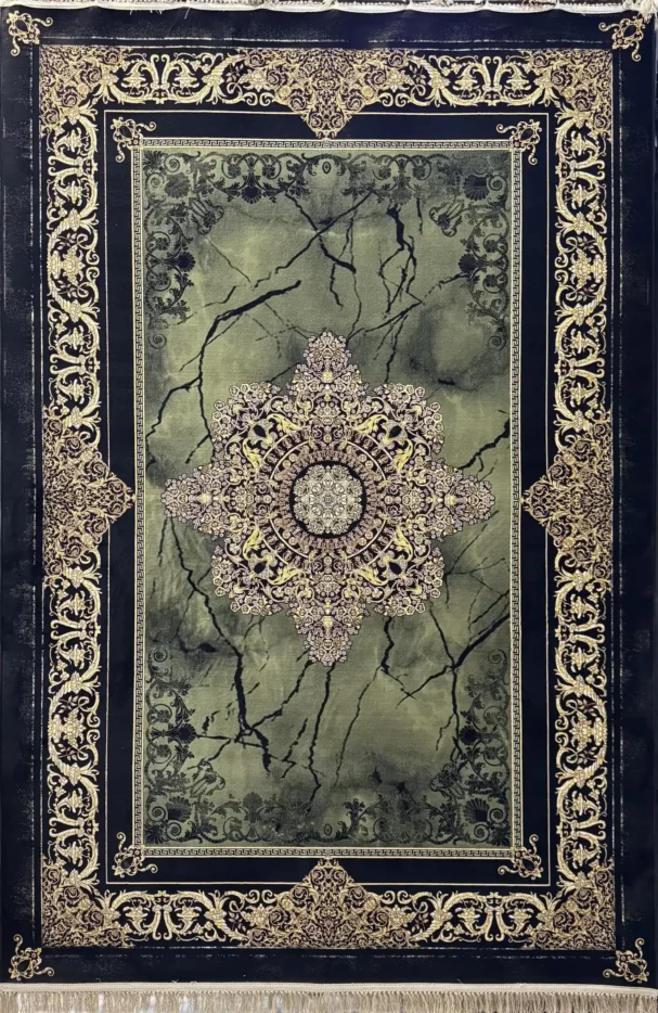 A Qaleen Carpets rug with a green and gold design, featuring a central medallion surrounded by intricate patterns and a