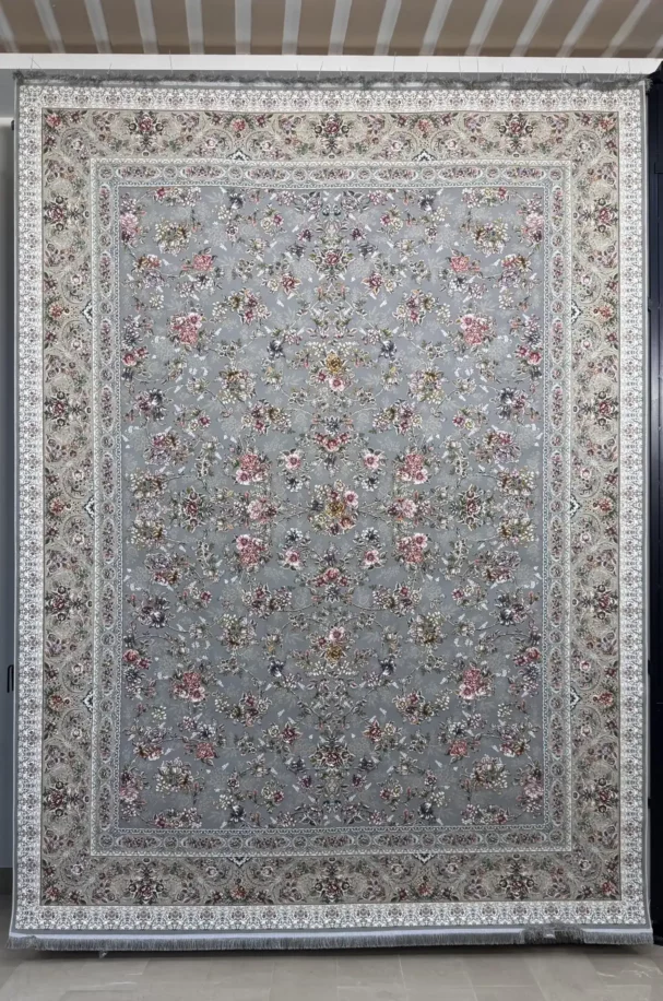 Carpets A large, light gray carpet with a floral pattern