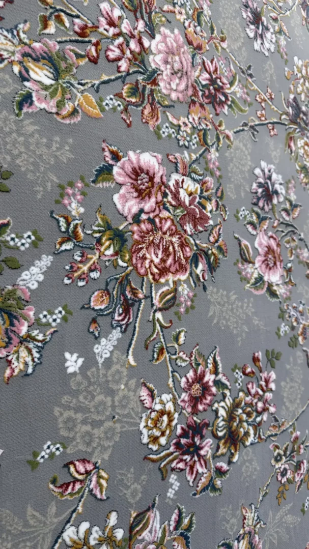 Carpets A close-up of a carpet with a floral pattern