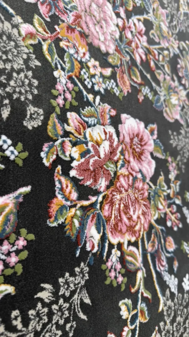 Carpets A close-up of a carpet with a floral pattern